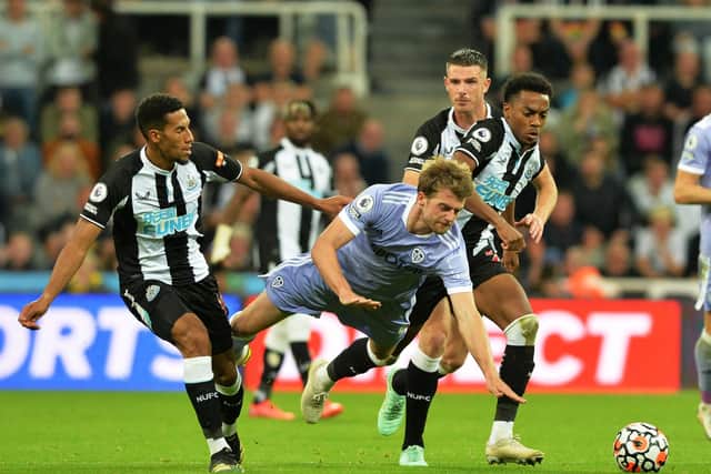 Leeds United's Patrick Bamford is blocked off by the Newcastle United defence.  Picture Bruce Rollinson