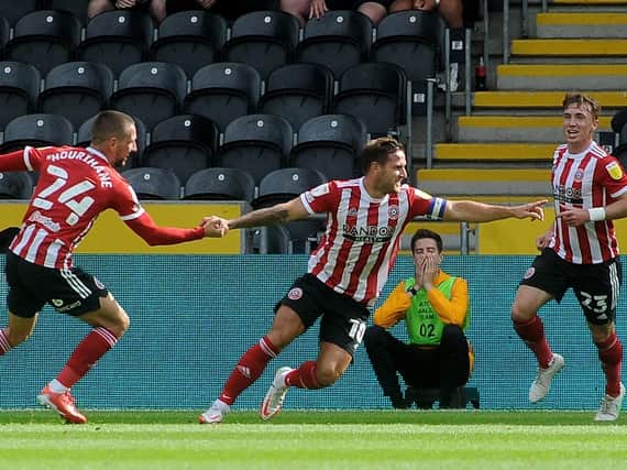 Billy Sharp celebrates his goal for Sheffield United at Hull City. Picture: Jonathan Gawthorpe.