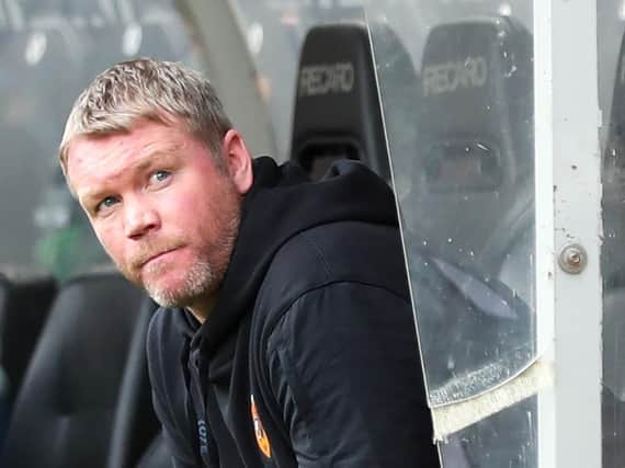 Hull City head coach Grant McCann, pictured in the dug-out during the game with Sheffield United. Picture: PA.