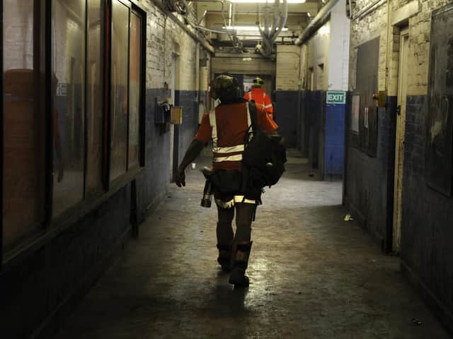 A miner walks to the showers after his last shift as deep coal mining comes to an end in the UK at Kellingley Colliery in 2015. Yorkshire leaders have said the lessons of the collapse of the coal-mining industry must be learnt as jobs change as a result of net zero targets. Picture Bruce Rollinson