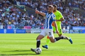 Flatter to deceive: Harry Toffolo lines up a shot against the bright yellow shirts of Nottingham Forest who were able to nullify Huddersfield Town, much to the frustration of head coach Carlos Corberan. (Picture: MI News/NurPhoto/Shutterstock)