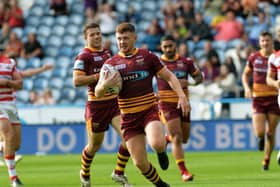 Huddersfield Giants' OIly Russell scores in the first half (JONATHAN GAWTHORPE)