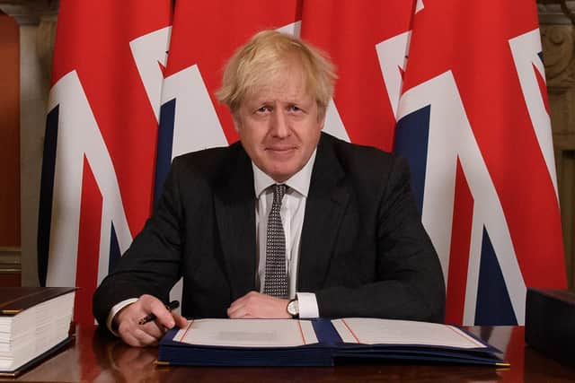 This was Boris Johnson signing his Brexit deal with the EU last December - but has the Government lived up to its promises on the benefits of Britain leaving the European Union?