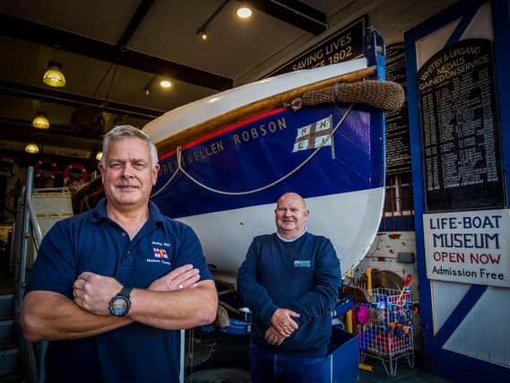 Whitby lifeboat museum curator Neil Williamson with shop manager Barrie Lazenby outside the museum where 'Robert & Ellen Robson' is currently housed