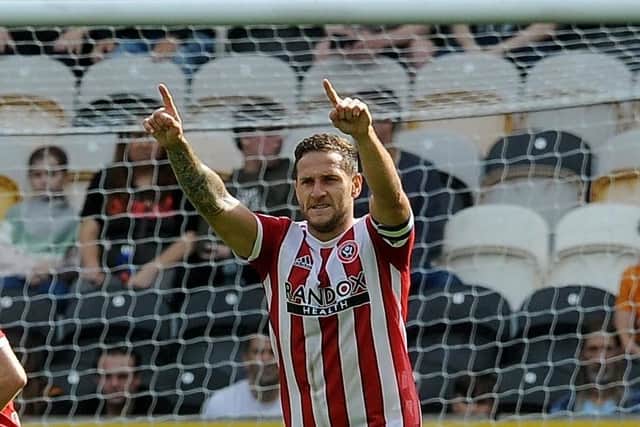 IN THE GOALS: Billy Sharp celebrates the opening goal for Sheffield United against Hull City at the weekend. Picture: Simon Hulme.