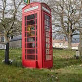 Traditional phone boxes such as this one in Patrick Brompton in the Yorkshire Dales, have been repurposed into libraries, defibrillator units and exhibition spaces