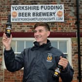 Harry Kinder with Yorkshire Pudding Beer at Malton Brewery.