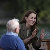 The Duchess of Cambridge (centre) meets Ike Alter and Diane Stoller in the steam launch Osprey on Windermere
