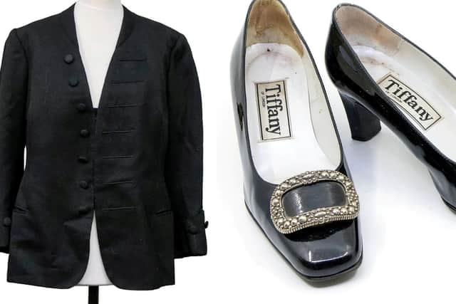 The jacket and shoes which will go up for auction