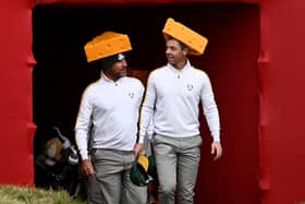 Wild about cheese: Team Europe’s Lee Westwood, left, and Rory McIlroy arrive on the first tee wearing Green Bay Packers Cheesehead hats ahead of the 43rd Ryder Cup at Whistling Straits. (Picture: Anthony Behar/PA)