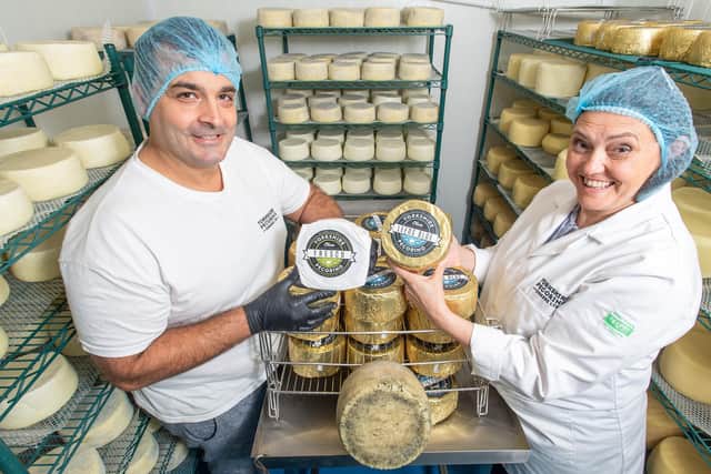 Mario  and Sonia Olianas with Leeds Blue cheeses at their Yorkshire Pecorino creamery in Otley Picture Bruce Rollinson