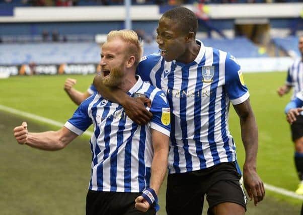 Sheffield Wednesday captain Barry Bannan celebrates after opening the scoring against Doncaster Rovers with in August with Dennis Adeniran. Picture: Steve Ellis