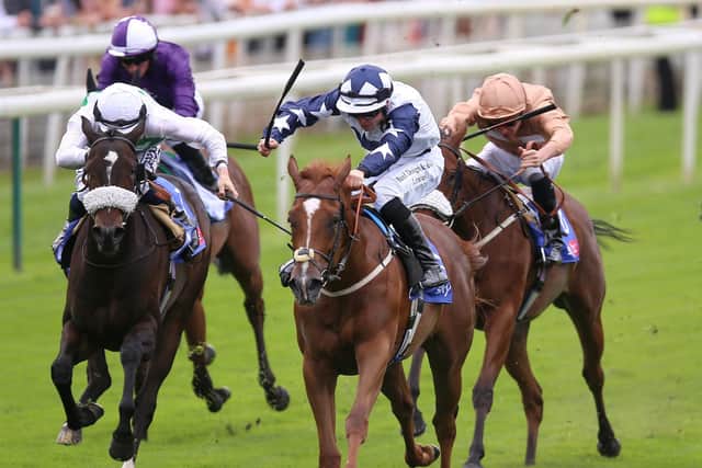 Zain Claudette and Ray Dawson (left) coming home to win the Sky Bet Lowther Stakes during Darley Yorkshire Oaks day of the Welcome to Yorkshire Ebor Festival 2021 at York racecourse.