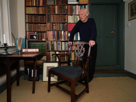 Curator Patrick Wildgust with the chair in the study at Shandy Hall. Picture by Jonathan Gawthorpe