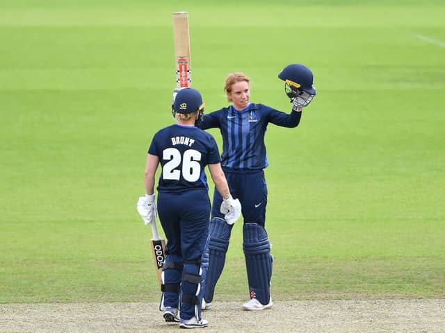 Lauren Winfield-Hill celebrates her century with Katherine Brunt against Central Sparks. (Picture: Will Palmer/SWPix.com)