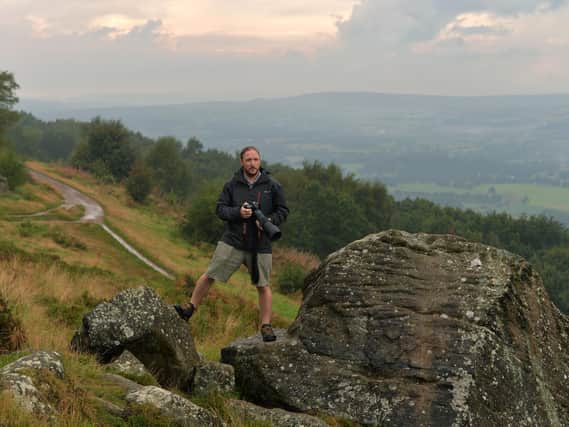 Wildlife Friendly Otley is to host the UK's first wildlife arts festival, showcasing art from photography to sculpture to poetry and embroidery, with one of Britain's top wildlife filmmakers Ian McCarthy headlining. Pictured local photographer Huw Williams on Otley Chevin. Picture : Jonathan Gawthorpe