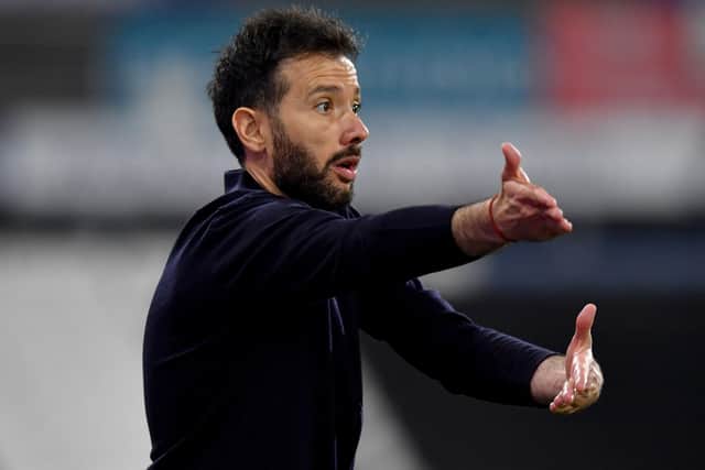 Huddersfield Town manager Carlos Corberan gestures from the touchline (Picture: PA)