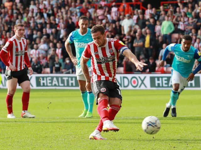 WINNER: Billy Sharp smashes home his penalty for Sheffield United