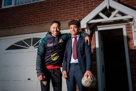 Quentin Laulu-Togaga'e (left) and his son Phoenix (right) of Keighley Cougars are pictured at their home in Sheffield in March after becoming only the third father and son duo to play together in a British rugby league game in a game against Dewsbury Rams. (Alex Whitehead/SWpix.com)