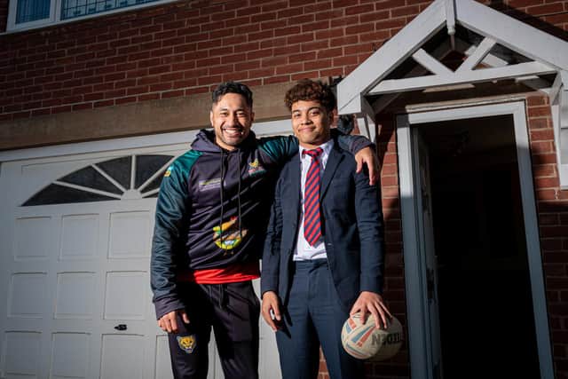 Quentin Laulu-Togaga'e (left) and his son Phoenix (right) of Keighley Cougars are pictured at their home in Sheffield in March after becoming only the third father and son duo to play together in a British rugby league game in a game against Dewsbury Rams. (Alex Whitehead/SWpix.com)