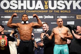 Anthony Joshua (left) and Oleksandr Usyk during a weigh in at The O2 London