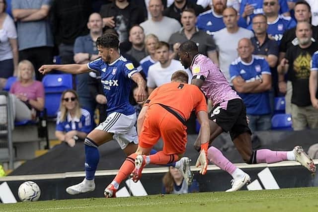 Ipswich's Macauley Bonne nips in to nick the ball off Owls keeper Bailey Peacock-Farrell to set up the equalising goal.  Picture: Steve Ellis