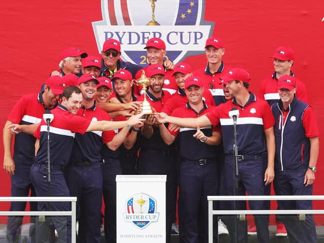 Team United States celebrates with the Ryder Cup after defeating Team Europe 19 to 9. (Photo by Stacy Revere/Getty Images)