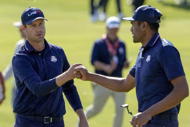 USA's Harris English is congratulated by Tony Finau on the sixth hole during their four-ball match against Shane Lowry and Tyrell Hatton at Whistling Straits Picture: AP/Jeff Roberson