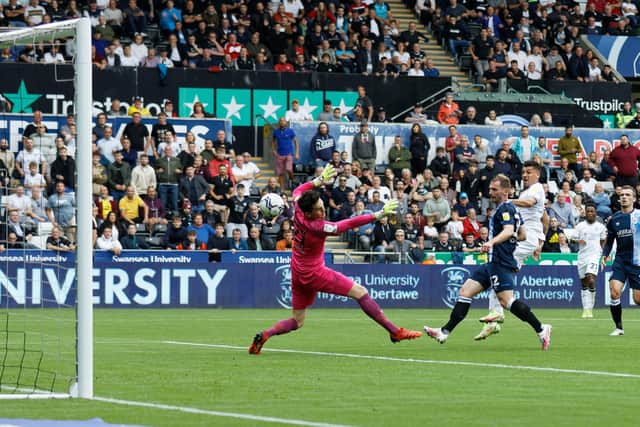 DECISIVE MOMENT: Swansea City's Joel Piroe fires past Huddersfiel Town goalkeeper Lee Nicholls with what proverd to be the winning goal. Picture: Getty Images