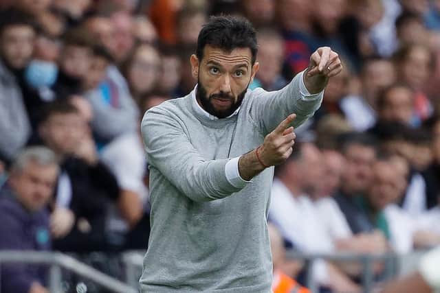 Huddersfield Town manager Carlos Corberan gestures on the touchline at Swansea City Picture: Getty Images