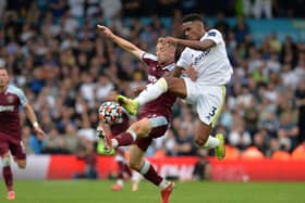Leeds United's Junior Firpo and West Ham United's Jarrod Bowen challenge for the ball at Elland Road. Picture: Bruce Rollinson