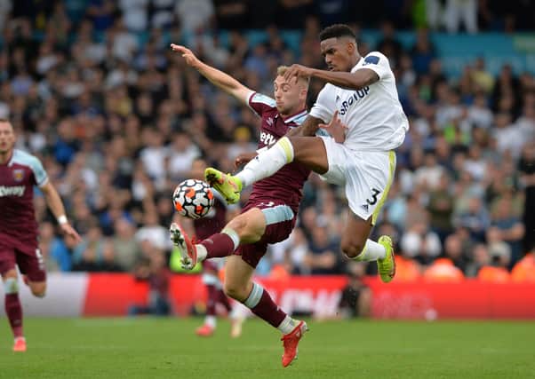 Leeds United's Junior Firpo and West Ham United's Jarrod Bowen challenge for the ball at Elland Road. Picture: Bruce Rollinson