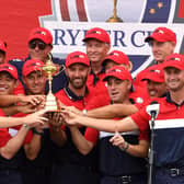 A team united: The 12 players of the United States team celebrate their comprehensive win at Whistling Straits. (Picture: Anthony Behar/PA)