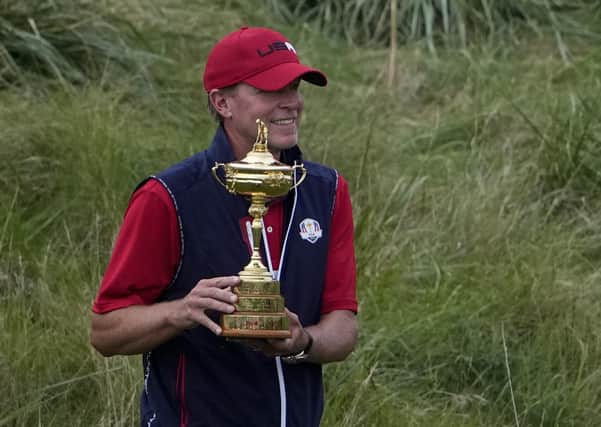 Steve Stricker, USA captain, with the Ryder Cup trophy