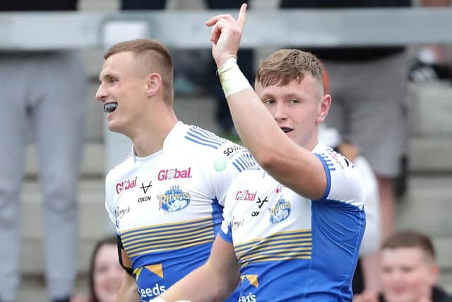 Leeds Rhinos' Harry Newman (right) celebrates scoring a try. Picture: Richard Sellers/PA Wire.