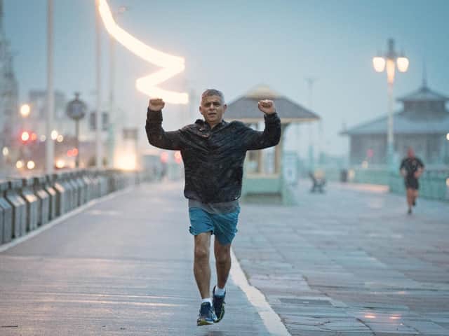 Mayor of London Sadiq Khan runs along the seafront in Brighton where the Labour Party is holding its conference (PA)