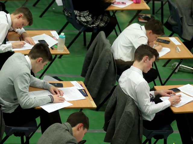 Undated file photo of students sitting an exam. (PA/Gareth Fuller)
