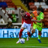 Barnsley captain Cauley Woodrow is brought down by Nottingham Forest's Tobias Figueiredo for the penalty. Picture: Tony Johnson.