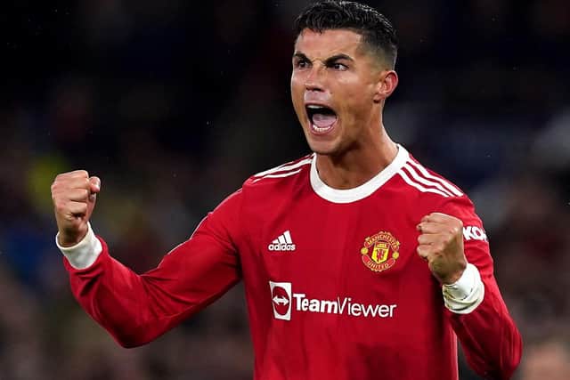 who else?: With Manchester United struggling towards a draw against their Europa League final conquerors Villareal, Cristiano Ronaldo popped up in the ‘95th minute’ to snatch a winner and get their Champions League campaign up and running. (Picture: Martin Rickett/PA)