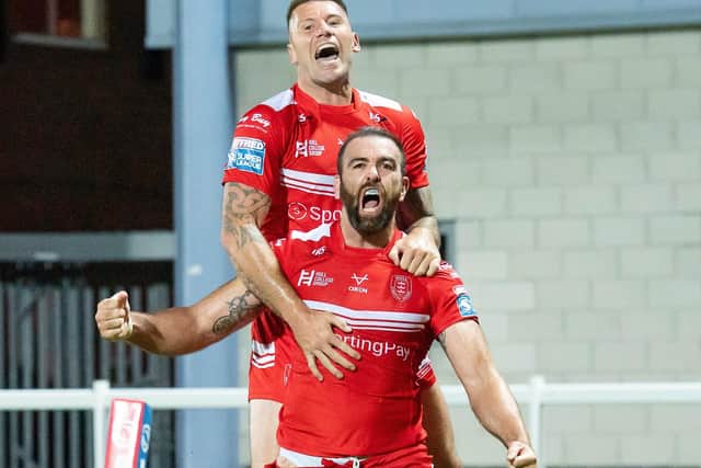 Hull KR's Kane Linnett celebrates his try against Wigan with Shaun Kenny-Dowall last month (Picture: SWpix.com)