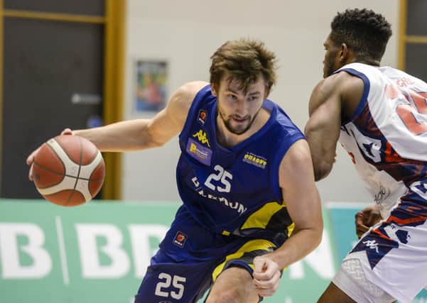 CATCH ME IF YOU CAN: 
Sheffield Sharks' Bennett Koch slips past his man in a BBL clash against Bristol Flyers last year. Picture: Dean Atkins.