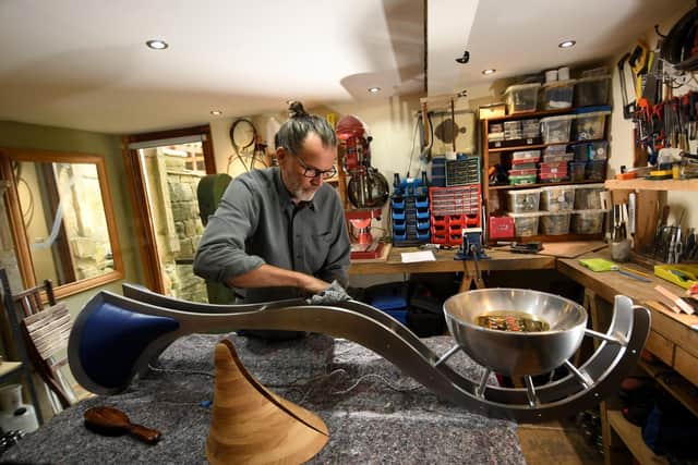 Dan Morrison from Todmorden at work on one of his lamps. (Simon Hulme).