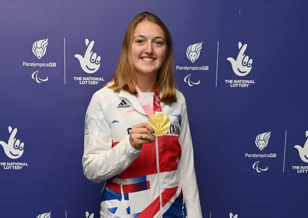 GOLDEN GIRL: Leeds’ Ellen Buttrick with her gold medal from the PR3 mixed coxed four at the Tokyo Paralympics. (Picture: Getty Images)