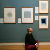 Pictured Devinia Skirrow viewing some of the work. 1st October2021. Picture : Jonathan Gawthorpe