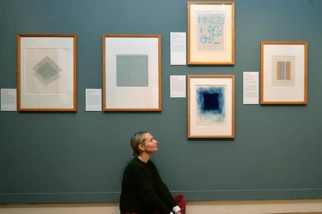 Pictured Devinia Skirrow viewing some of the work. 1st October2021. Picture : Jonathan Gawthorpe