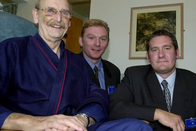 Barry North, pictured by The Yorkshire Post as he recovered in hospital in 2001, with his two rescuers Dave Clarke and Paul Bishop
