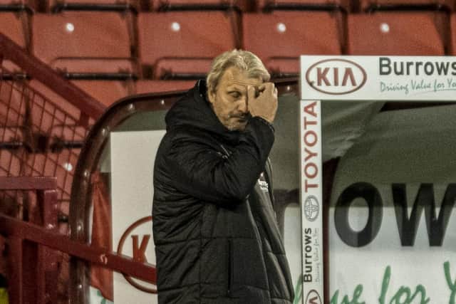 A lonely job: Markus Schopp on his own in the technical area as Barnsley lost their way against Nottingham Forest (Picture: Tony Johnson)