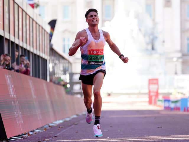 Phil Sesemann crosses the finish line at the London Marathon as the fastest British man