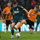 Middlesbrough's Paddy McNair tussles with Hull City rival Andy Cannon. Picture: PA.
