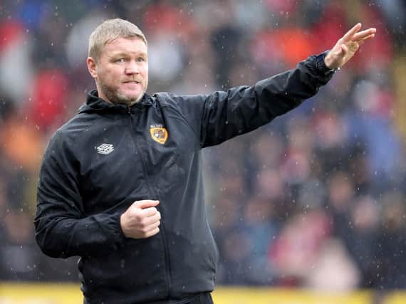 Hull City head coach Grant McCann points the way against Middlesbrough. Picture: PA.